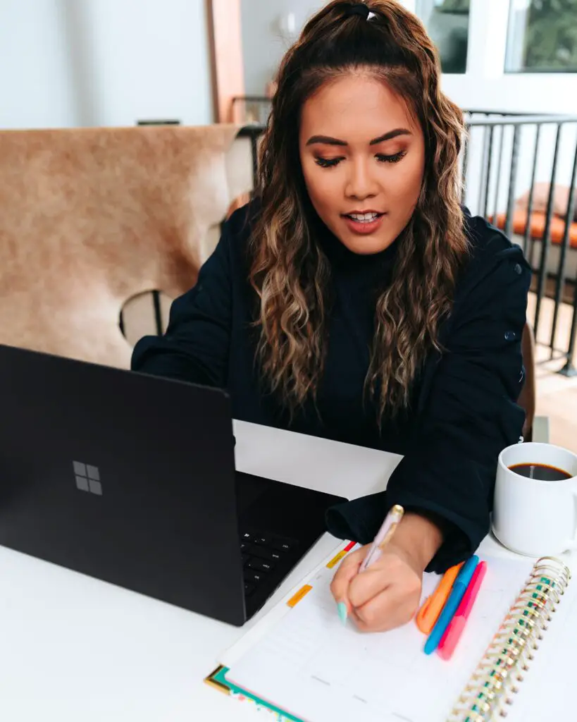 a girl studying ielts on a computer