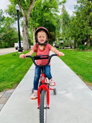 a girl riding bicycle