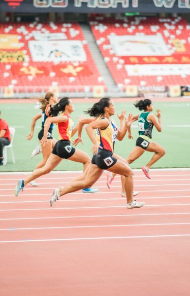 women running on track