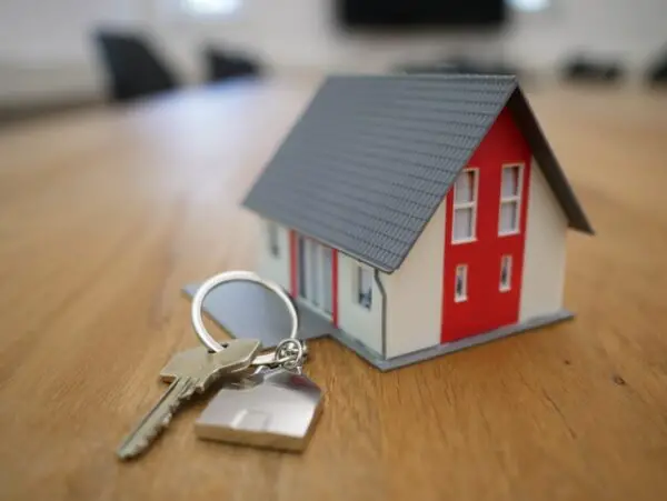 a miniature home used as key chain